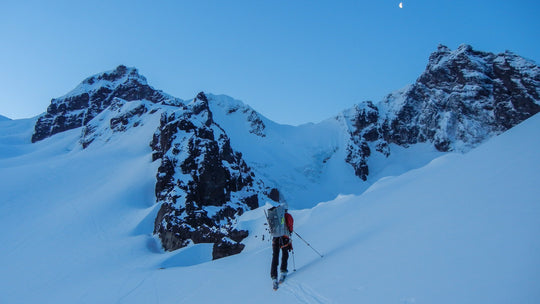 Skier touring on Mt Baker in Washington at dawn