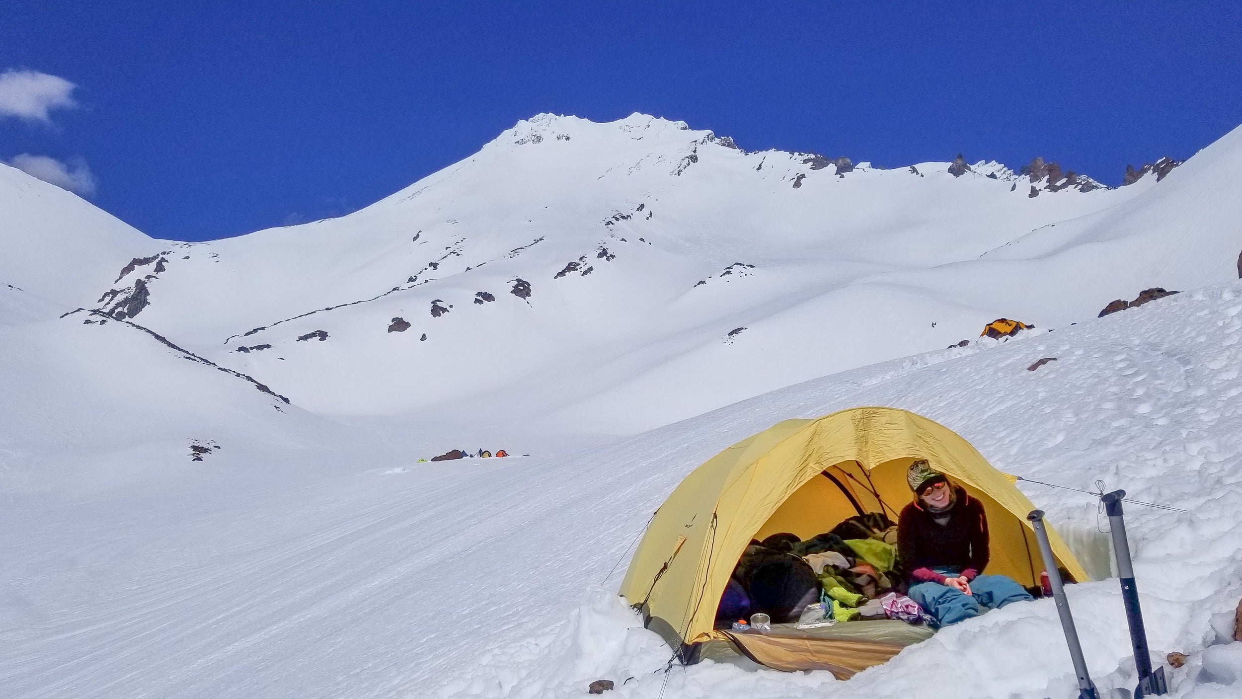 Skier camping at Helen Lake on Mt Shasta in California