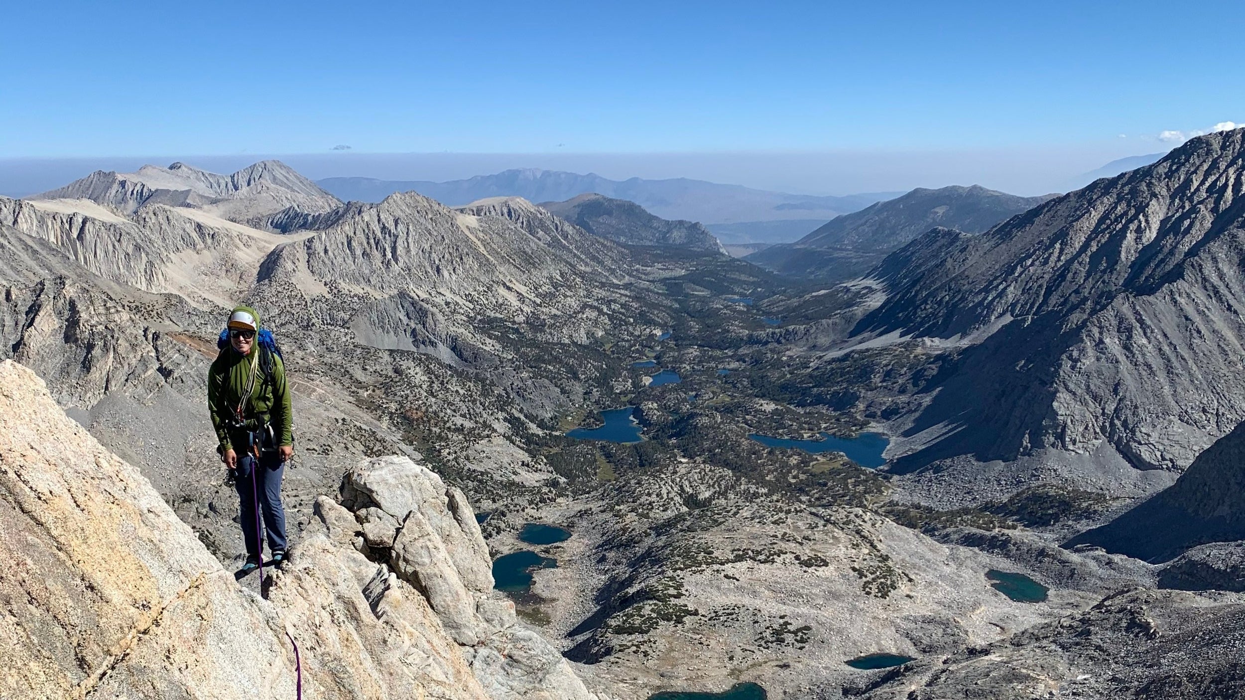 Exposure while rock climbing bear creek spire above little lakes valley in the eastern sierra of california