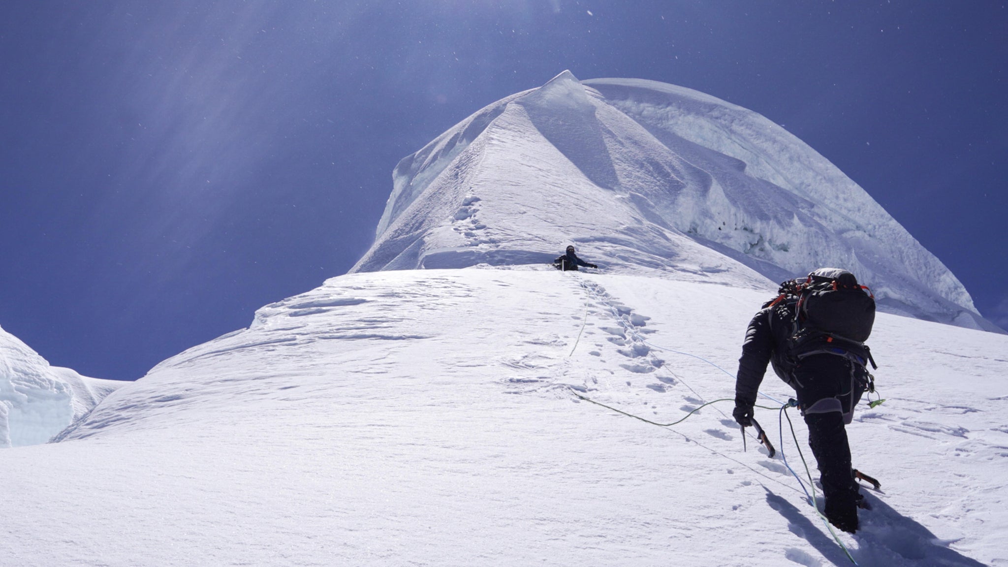 The summit of Tocllaraju in the Cordillera Blanca Peru. Photo: Zeb Blais.