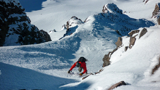 Climber climbing with crampons on Mt Shasta in California