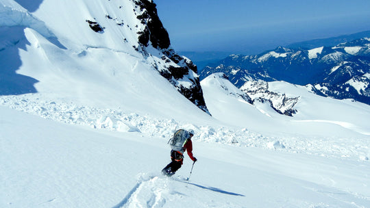 Skier making a powder turn near the summit of Mt Baker in Washington