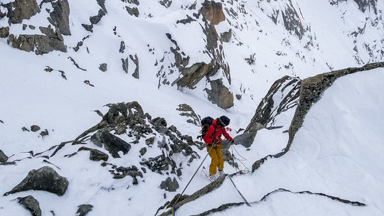 rappelling into the Cosmiques Couloir in Chamonix, French Alps 