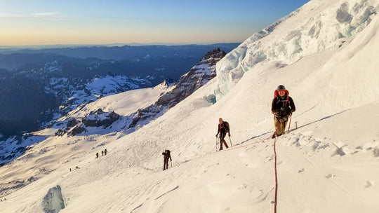 Climbers high on the Emmons Glacier route on Mount Rainier