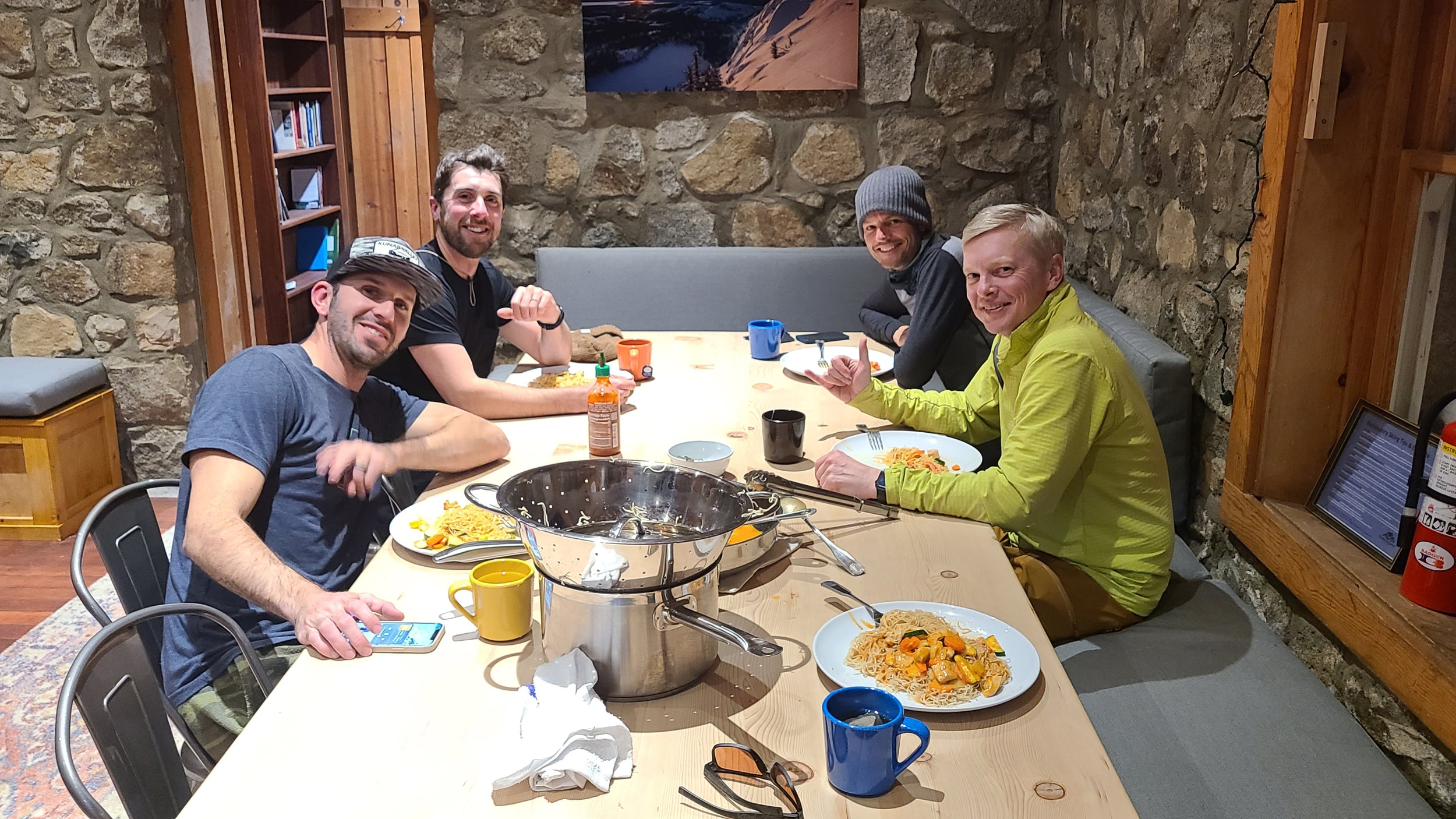 A private group having dinner at the Frog Lake Backcountry Ski Huts in Truckee