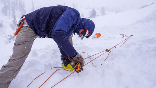 A student practicing during a crevasse rescue course in Tahoe