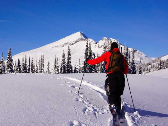 Skier touring toward Pyramid Peak in South Lake Tahoe