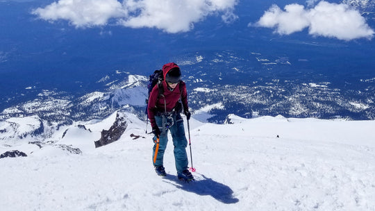Skier hiking on the summit of Mt Shasta during a Blackbird Guides Summit Climb 2 Day trip