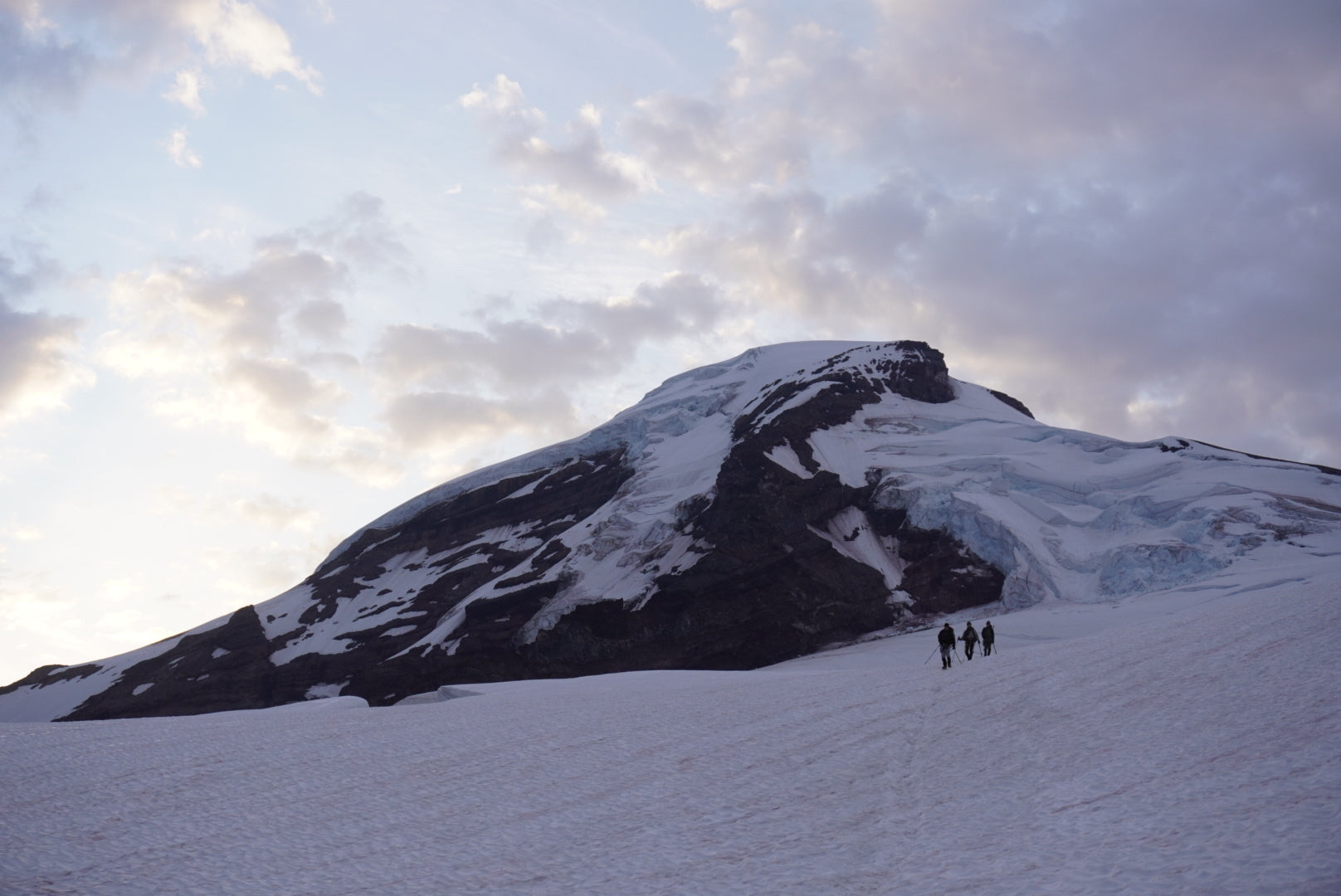 Three climbers on Coleman Glacier, Mt Baker